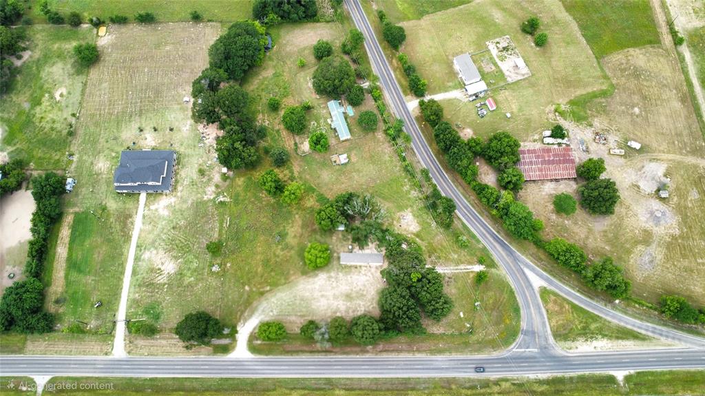 14628 Fm Road Scurry, TX 75158 - Photo 13 of 14 an aerial view of residential houses with outdoor space