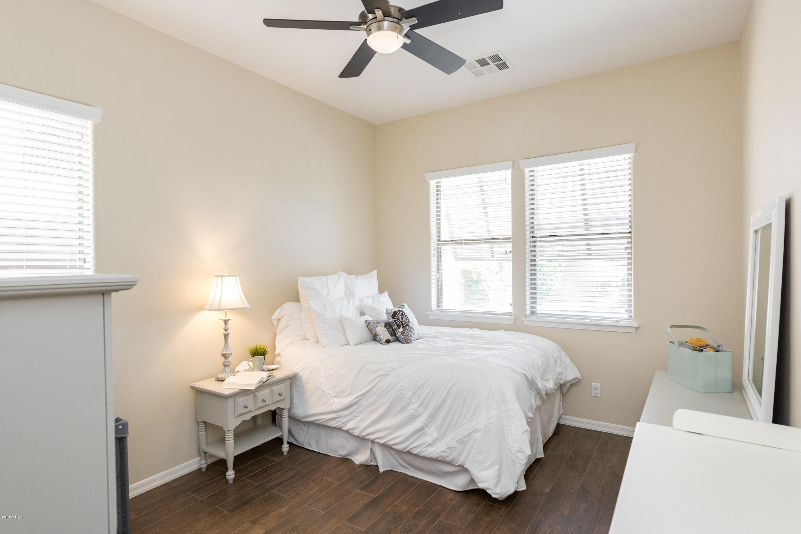9185 East Canyon View Road Scottsdale, AZ 85255 - Photo 18 of 47 a bedroom with a bed and a window