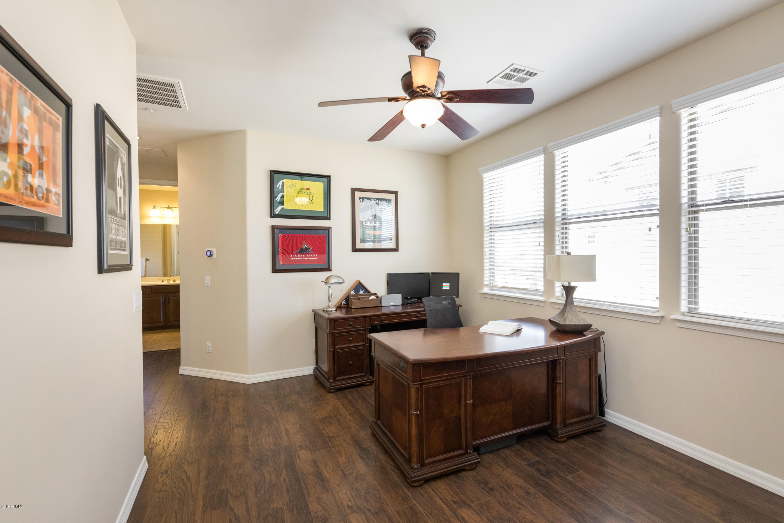 9185 East Canyon View Road Scottsdale, AZ 85255 - Photo 30 of 47 a view of a workspace with furniture and a window
