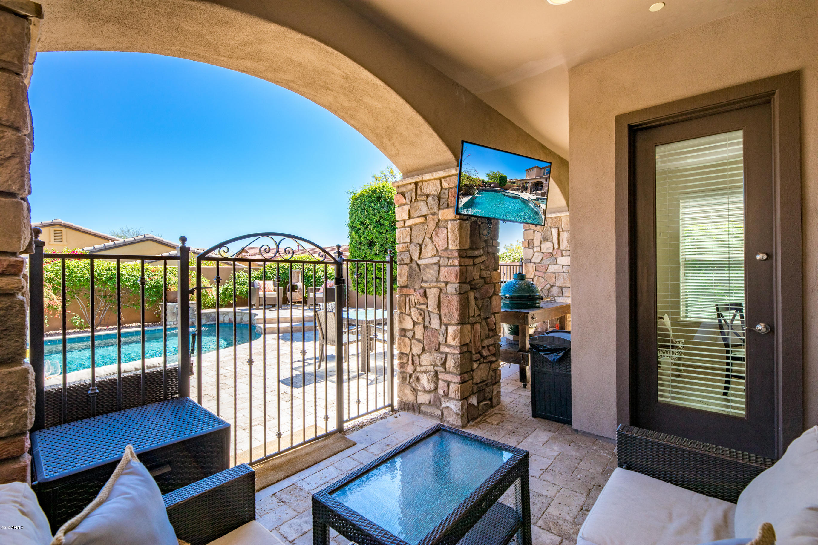 9185 East Canyon View Road Scottsdale, AZ 85255 - Photo 35 of 47 a view of an entryway with a balcony