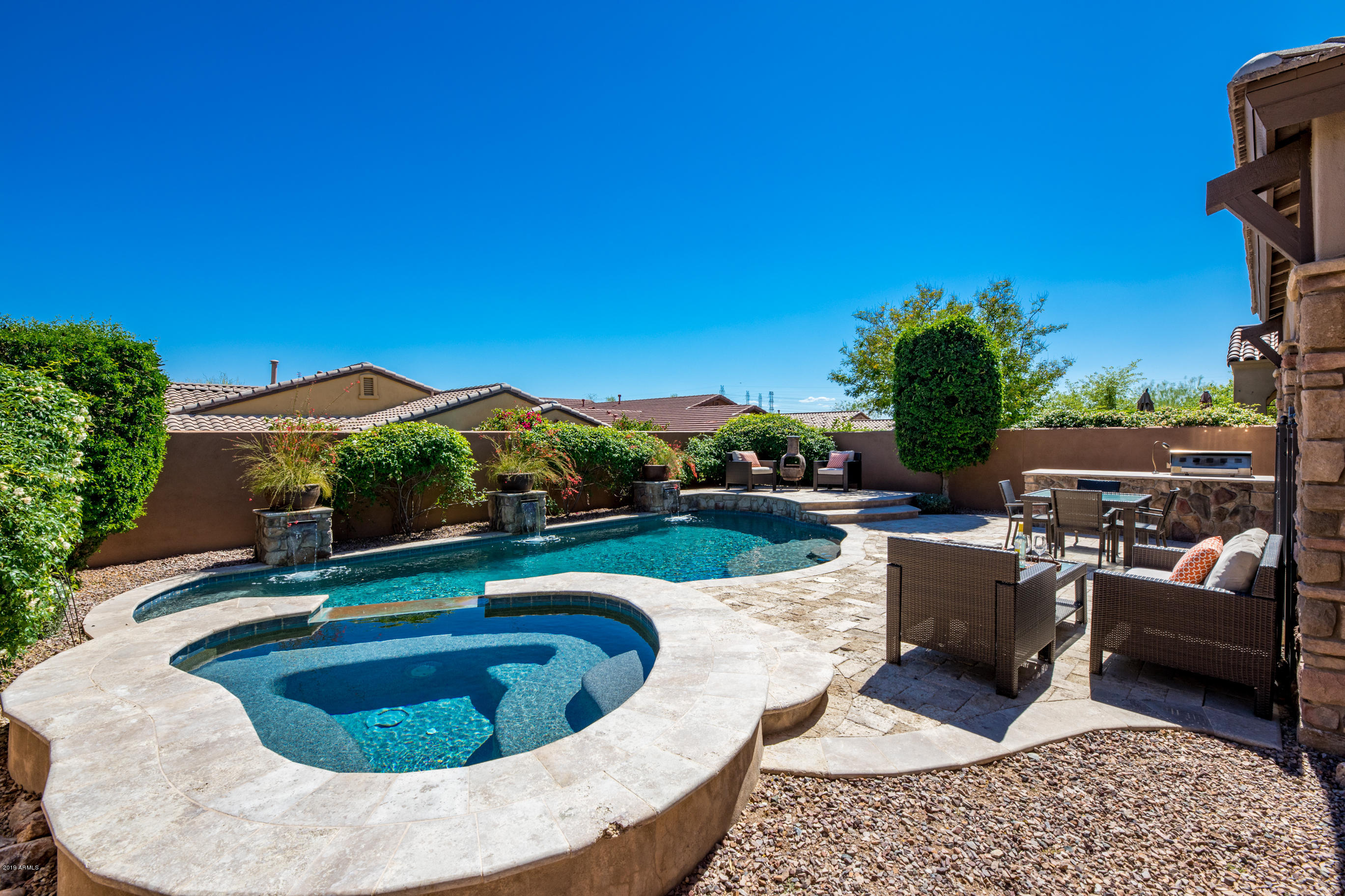 9185 East Canyon View Road Scottsdale, AZ 85255 - Photo 40 of 47 swimming pool view with a seating space
