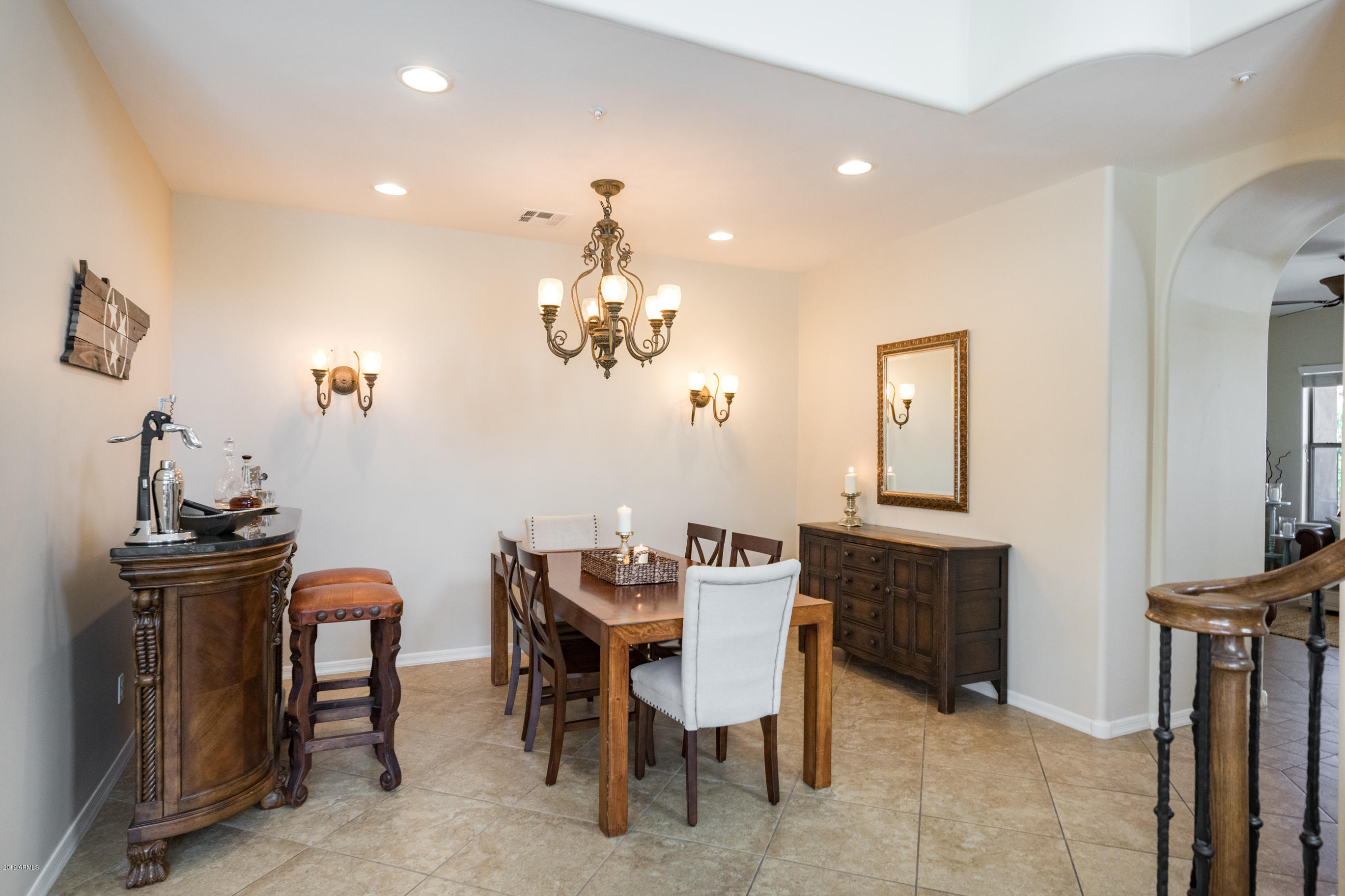 9185 East Canyon View Road Scottsdale, AZ 85255 - Photo 8 of 47 a view of a dining room with furniture