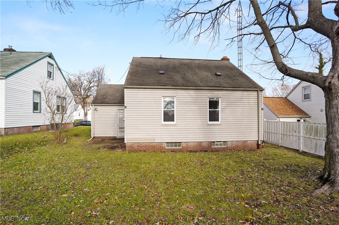 3206 9th Street Northwest Canton, OH 44708 - Photo 7 of 32 Rear view of property with a lawn