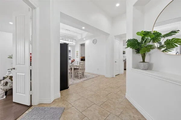 a view of a hallway with closet area