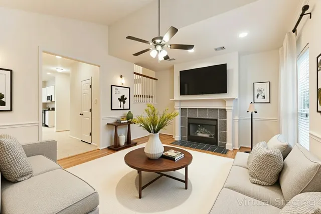 a bedroom with a bed and a fireplace