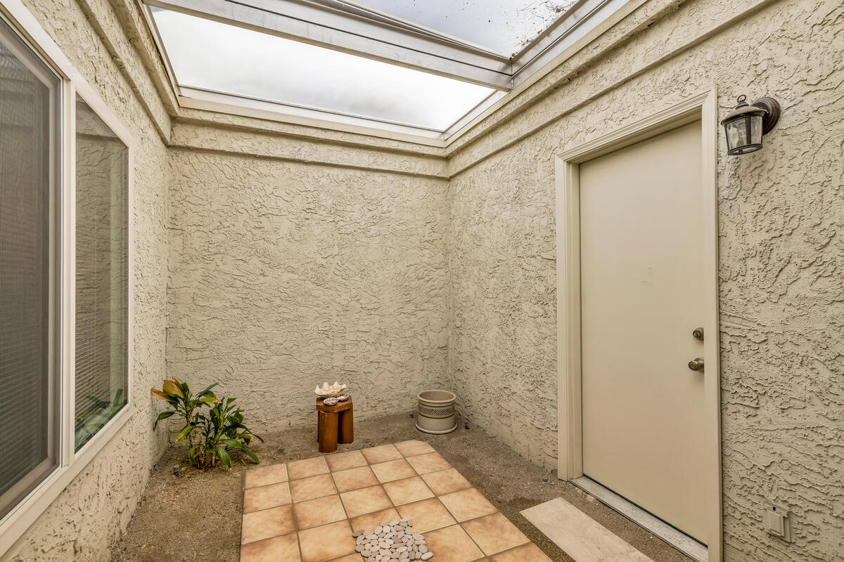 44149 Chamonix Court Palm Desert, CA 92260 - Photo 20 of 50 a bathroom with a shower