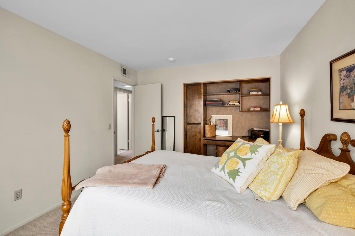 44149 Chamonix Court Palm Desert, CA 92260 - Photo 21 of 50 a bedroom with a bed and dresser