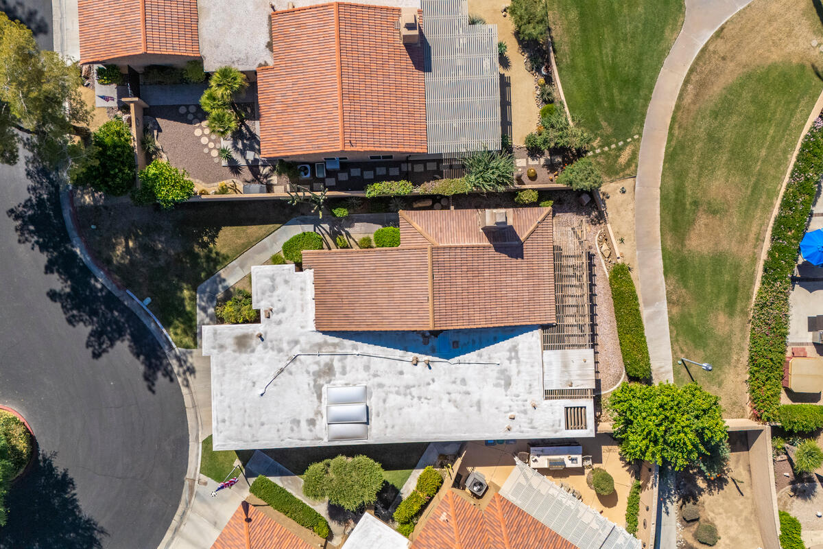 44149 Chamonix Court Palm Desert, CA 92260 - Photo 37 of 50 an aerial view of a house with a swimming pool