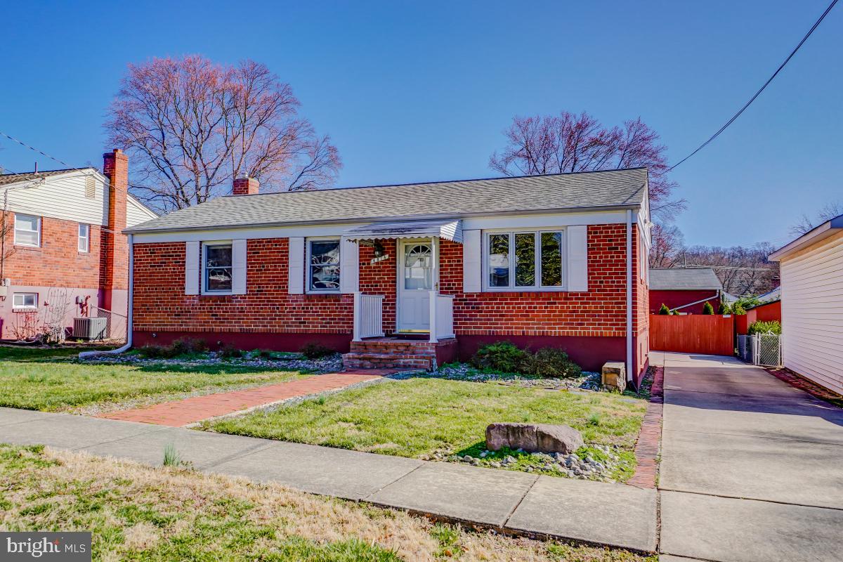 Brick home.  Extended driveway to 2 car garage.