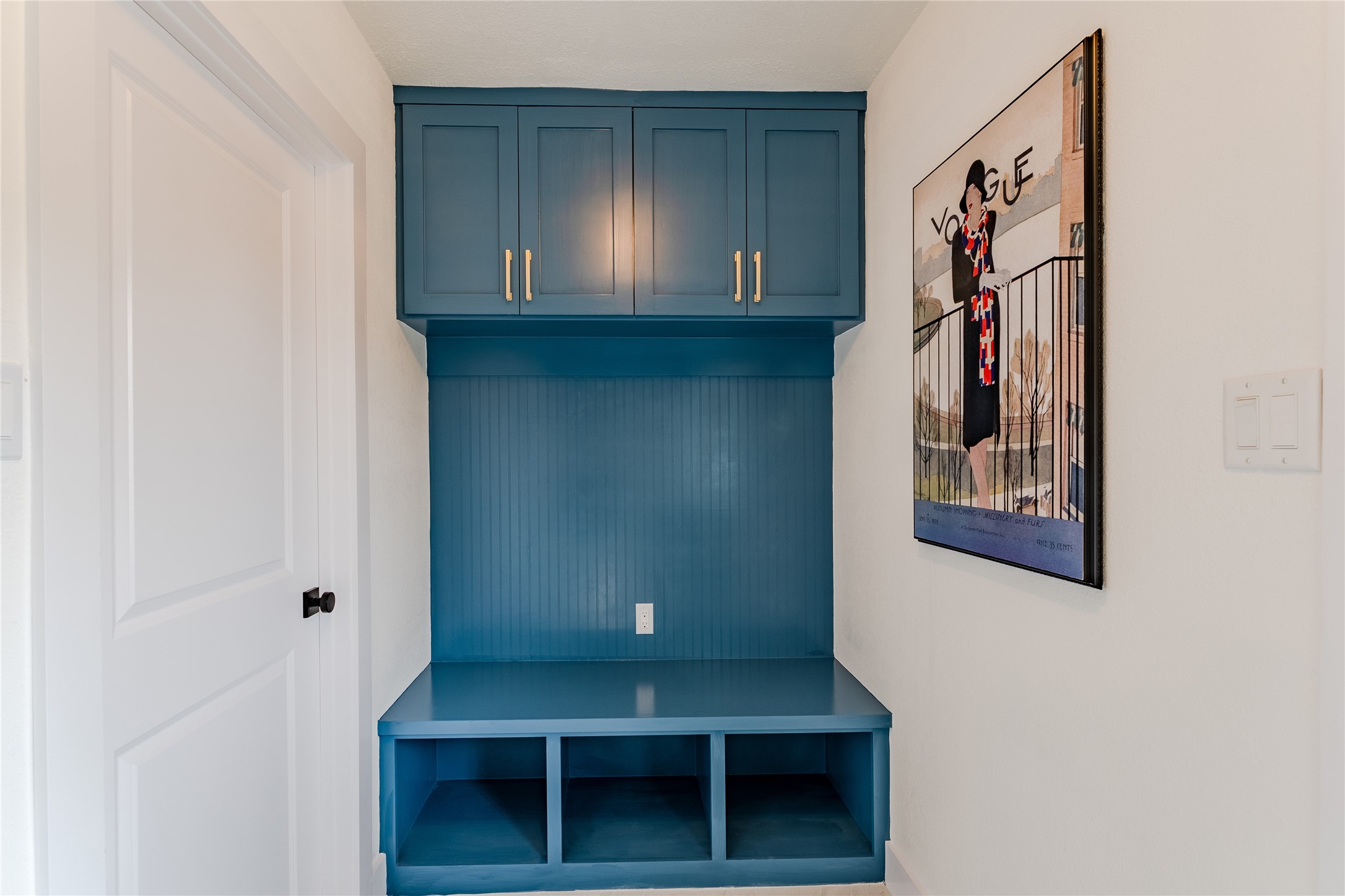 6027 Valkeith Drive Houston, TX 77096 - Photo 27 of 31 a view of staircase with wooden floor and cabinet