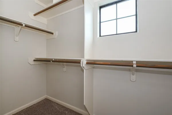 a view of a room with racks on the wall