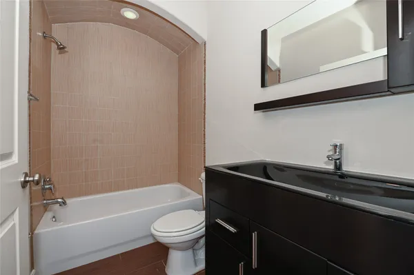 a bathroom with a sink and a bathtub