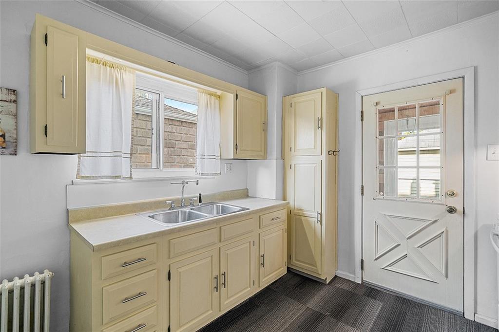 404 1/2 Franklin Avenue Vandergrift, PA 15690 - Photo 11 of 31 a bathroom with a sink and a window