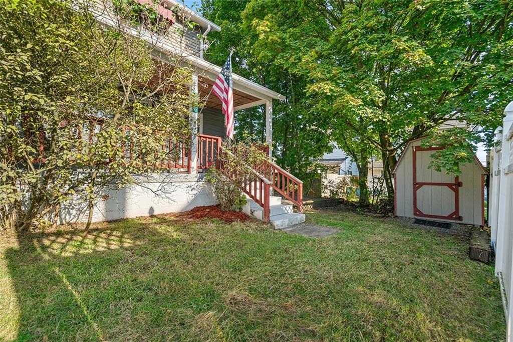 404 1/2 Franklin Avenue Vandergrift, PA 15690 - Photo 26 of 31 a view of a house with a yard and deck