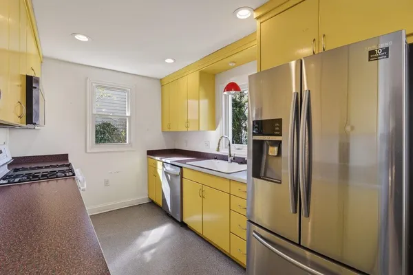 a bathroom with a toilet and shower