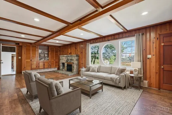 a spacious bathroom with a double vanity sink and a mirror