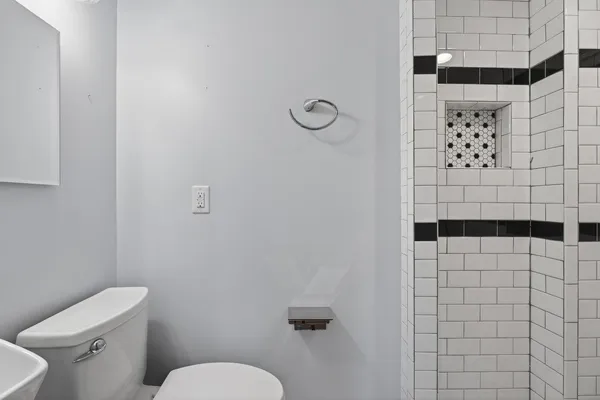 a view of a yard with plants and a houses