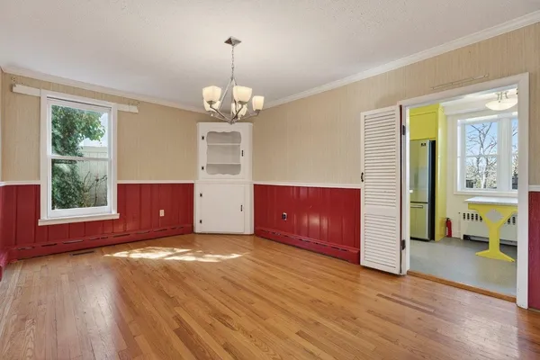 a kitchen with stainless steel appliances granite countertop a sink a stove and a microwave