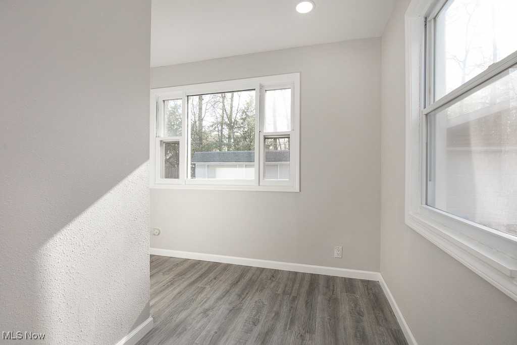 223 Beck Road Avon Lake, OH 44012 - Photo 14 of 29 Laundry room with wood finished floors, recessed lighting, and baseboards