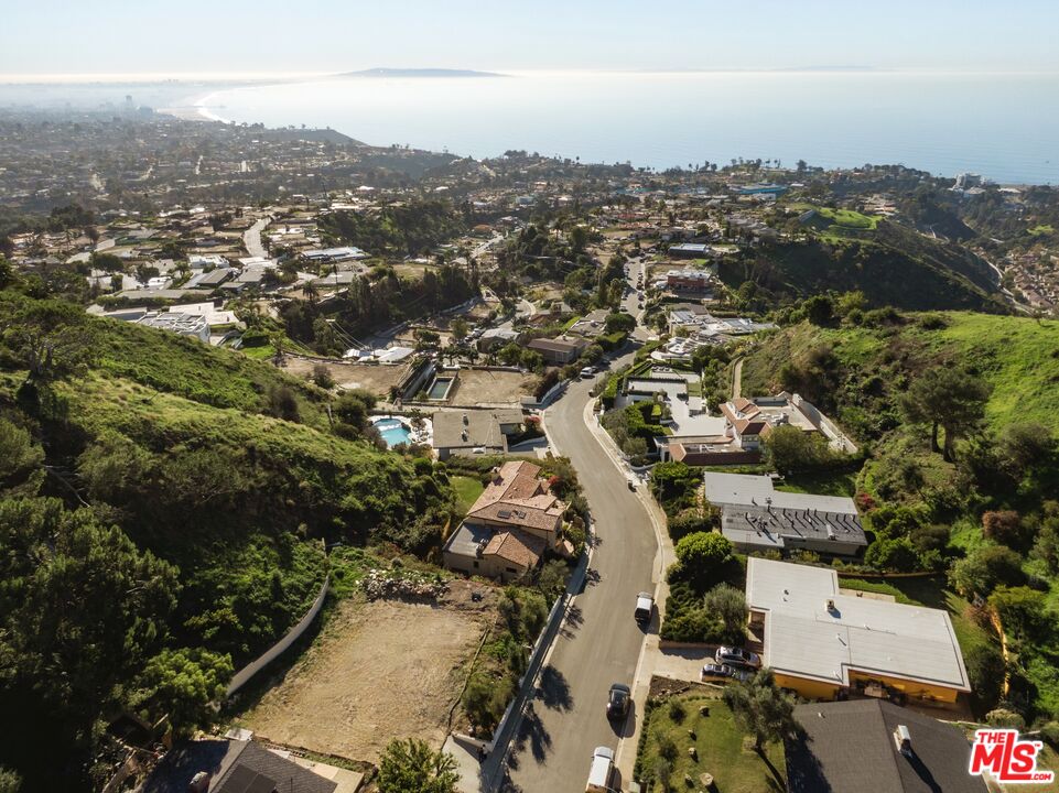 1046 Enchanted Way Pacific Palisades, CA 90272 - Photo 2 of 11 an aerial view of multiple house