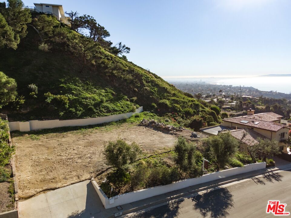 1046 Enchanted Way Pacific Palisades, CA 90272 - Photo 5 of 11 a view of a lake from a balcony