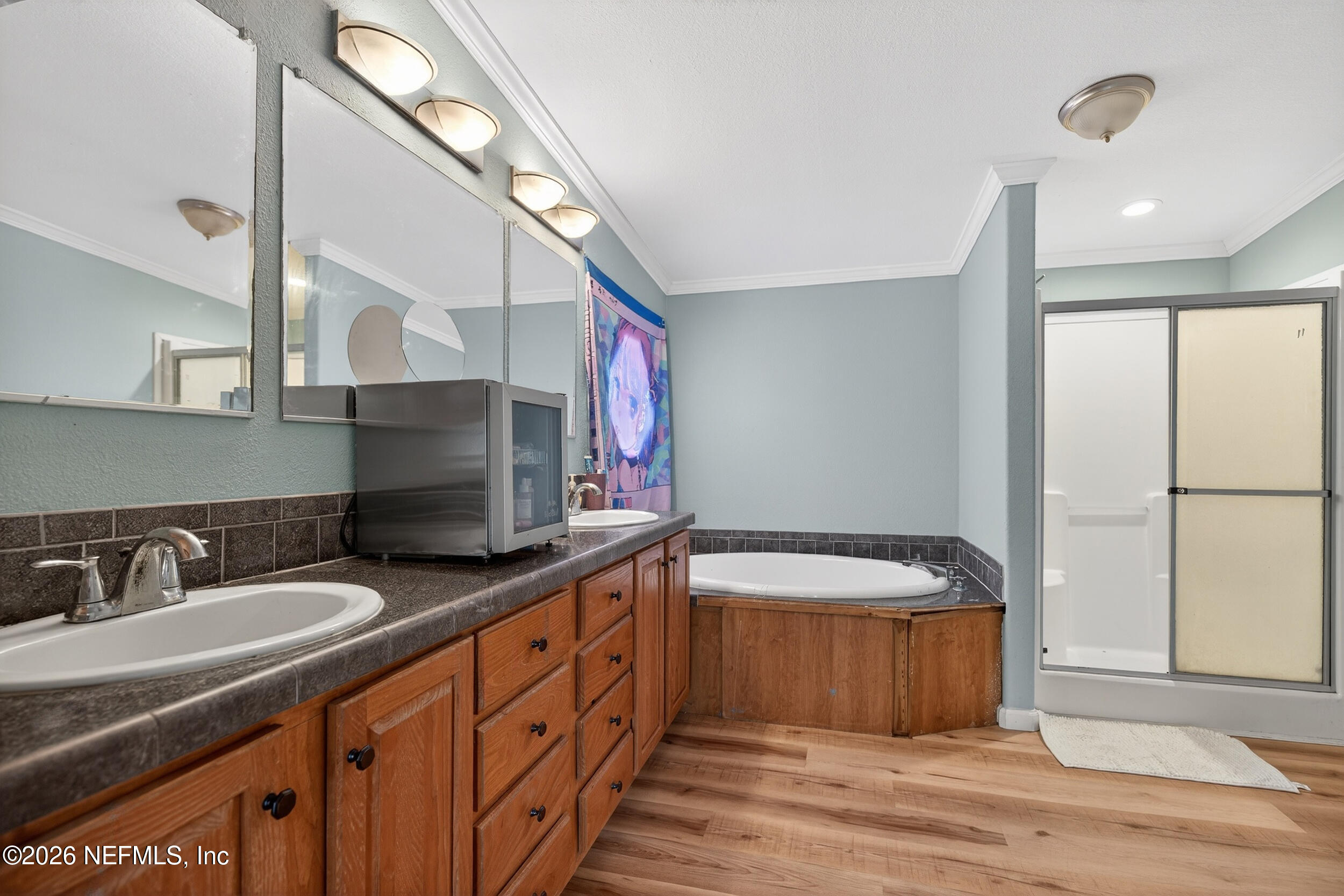 634 Harrison Street Jacksonville, FL 32220 - Photo 13 of 23 a bathroom with a granite countertop sink and a mirror