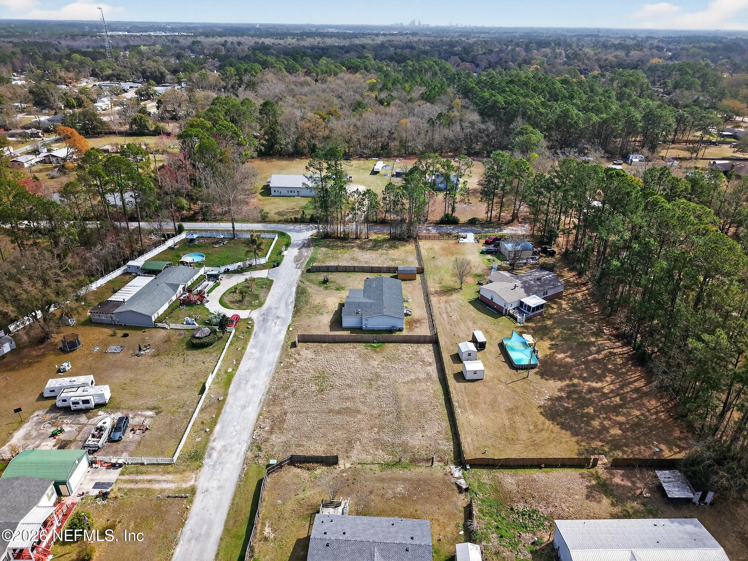 634 Harrison Street Jacksonville, FL 32220 - Photo 20 of 23 an aerial view of a house with a swimming pool