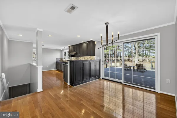 a view of a living room and a flat screen tv