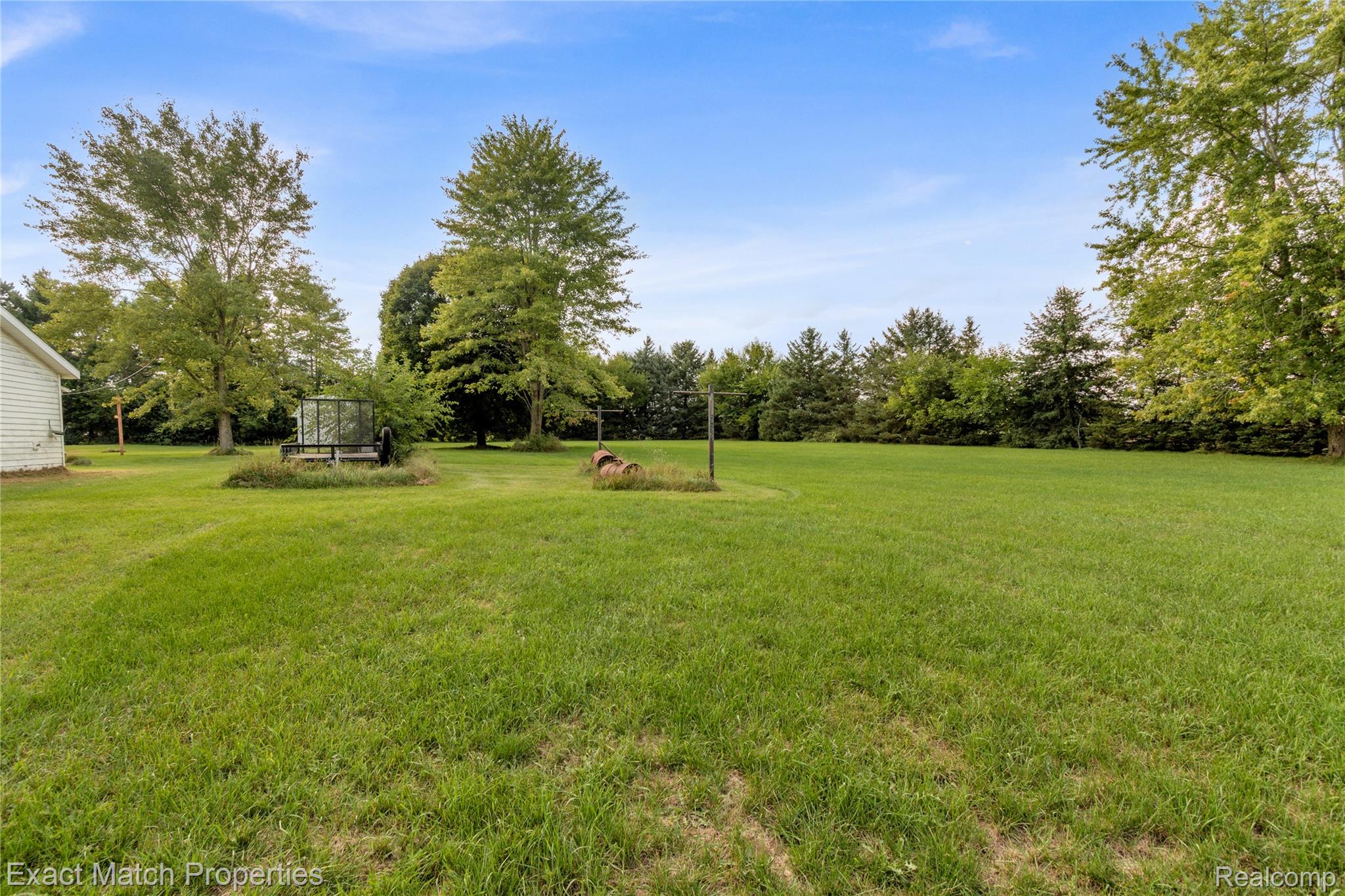 5468 Lippincott Road Lapeer, MI 48446 - Photo 11 of 36 Back yard for entertaining not counting the piece of property to the right!