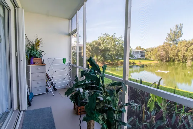 a view of a balcony with lake view
