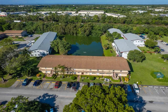an aerial view of a house with a garden