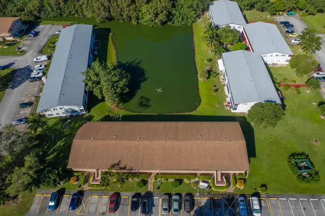 an aerial view of a house with a garden