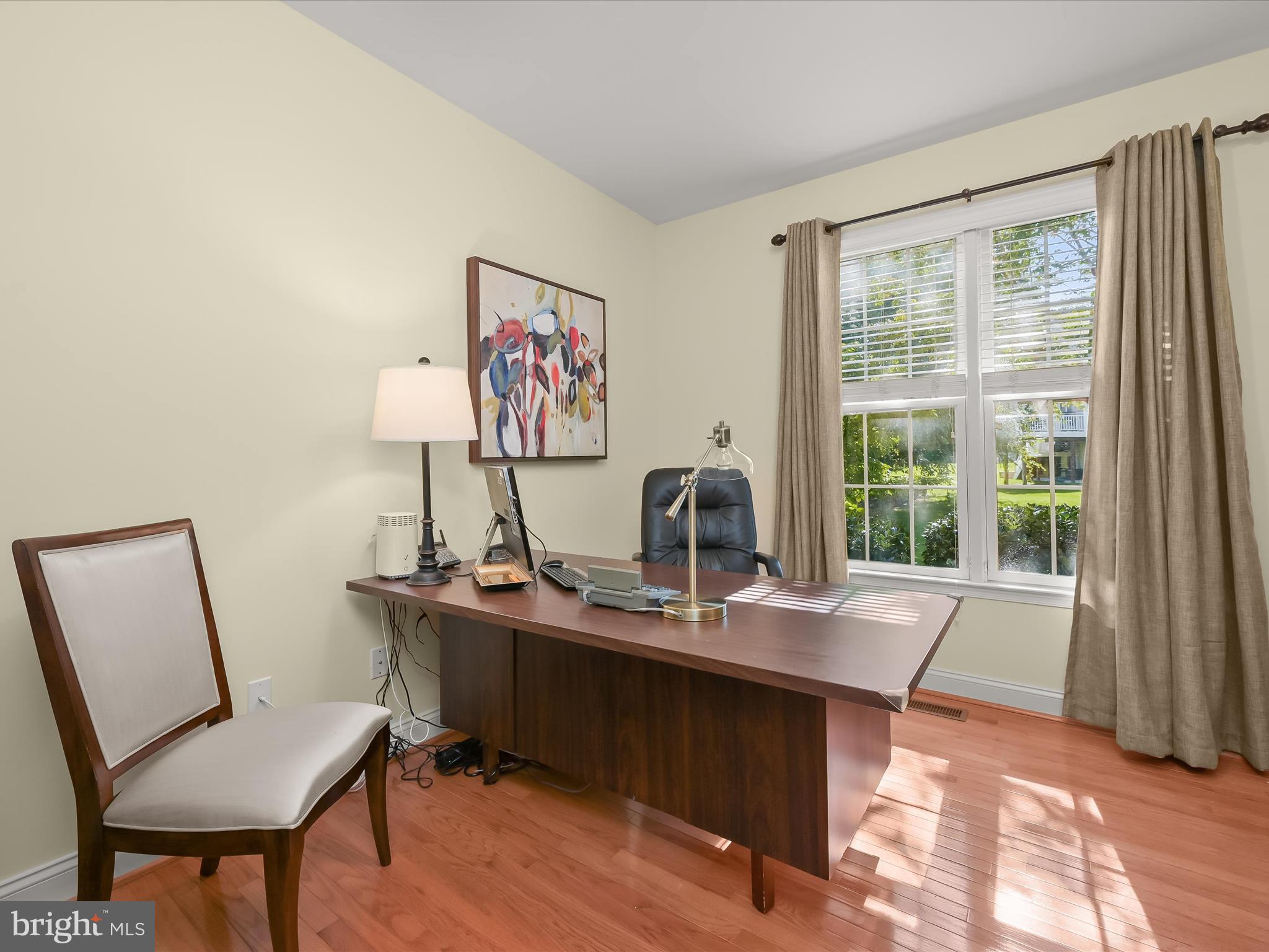 1525 Winfields Lane Gambrills, MD 21054 - Photo 23 of 65 a view of a workspace with furniture and a window
