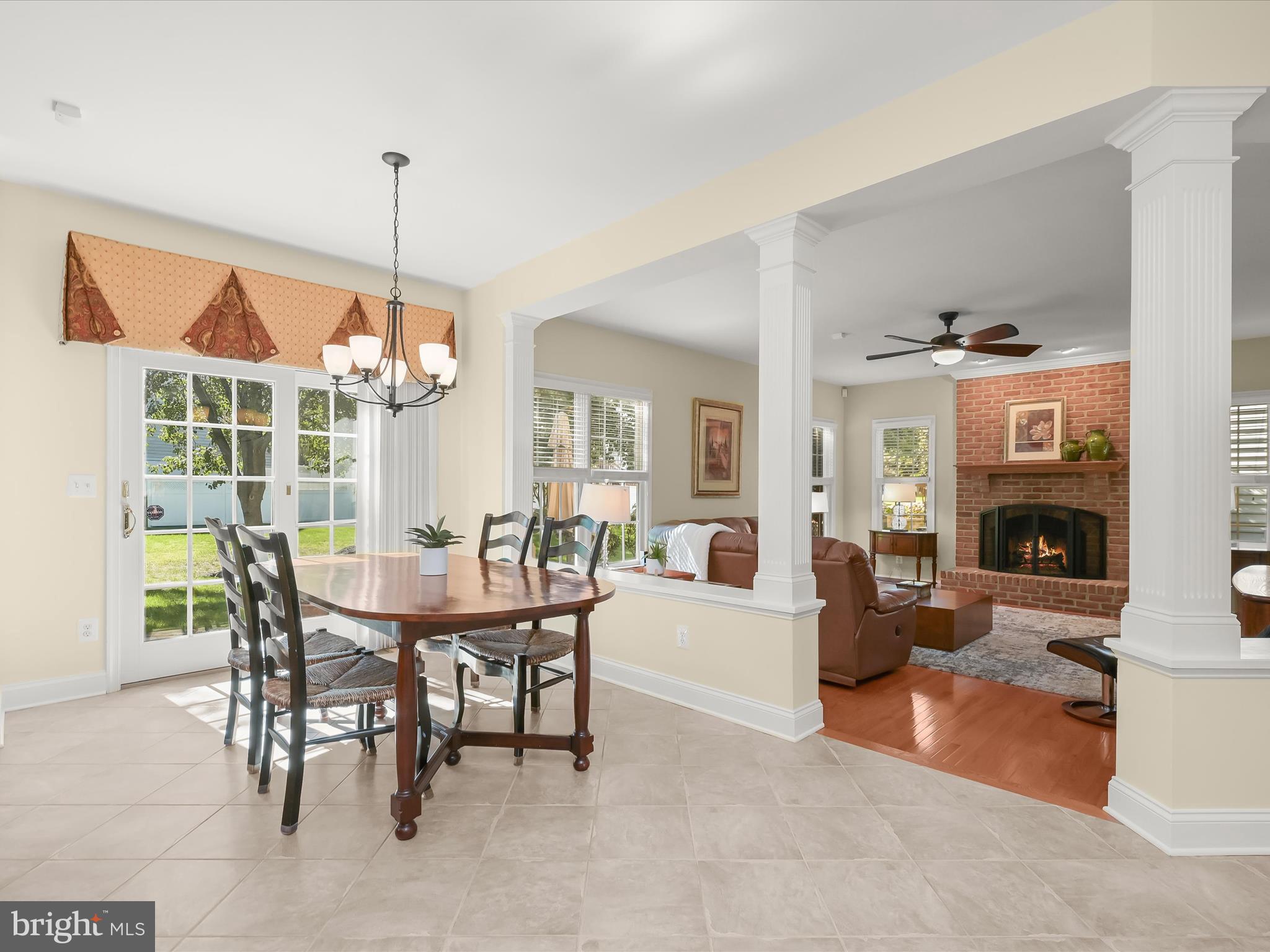 1525 Winfields Lane Gambrills, MD 21054 - Photo 25 of 65 a view of a dining room with furniture window and wooden floor
