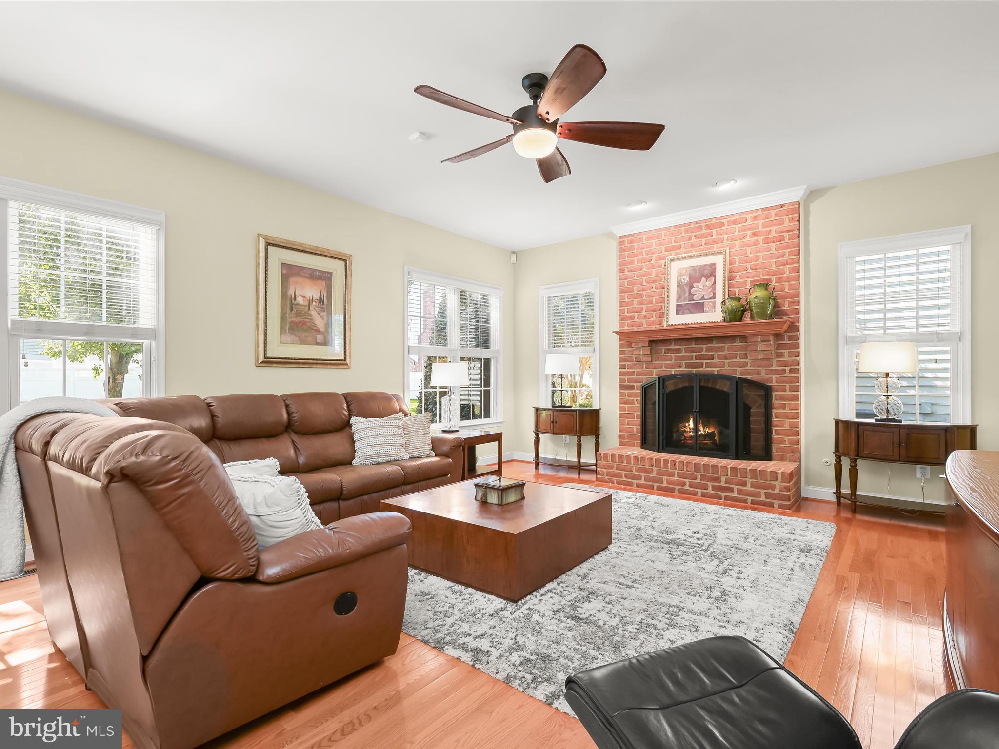 1525 Winfields Lane Gambrills, MD 21054 - Photo 26 of 65 a living room with furniture a window and a fireplace