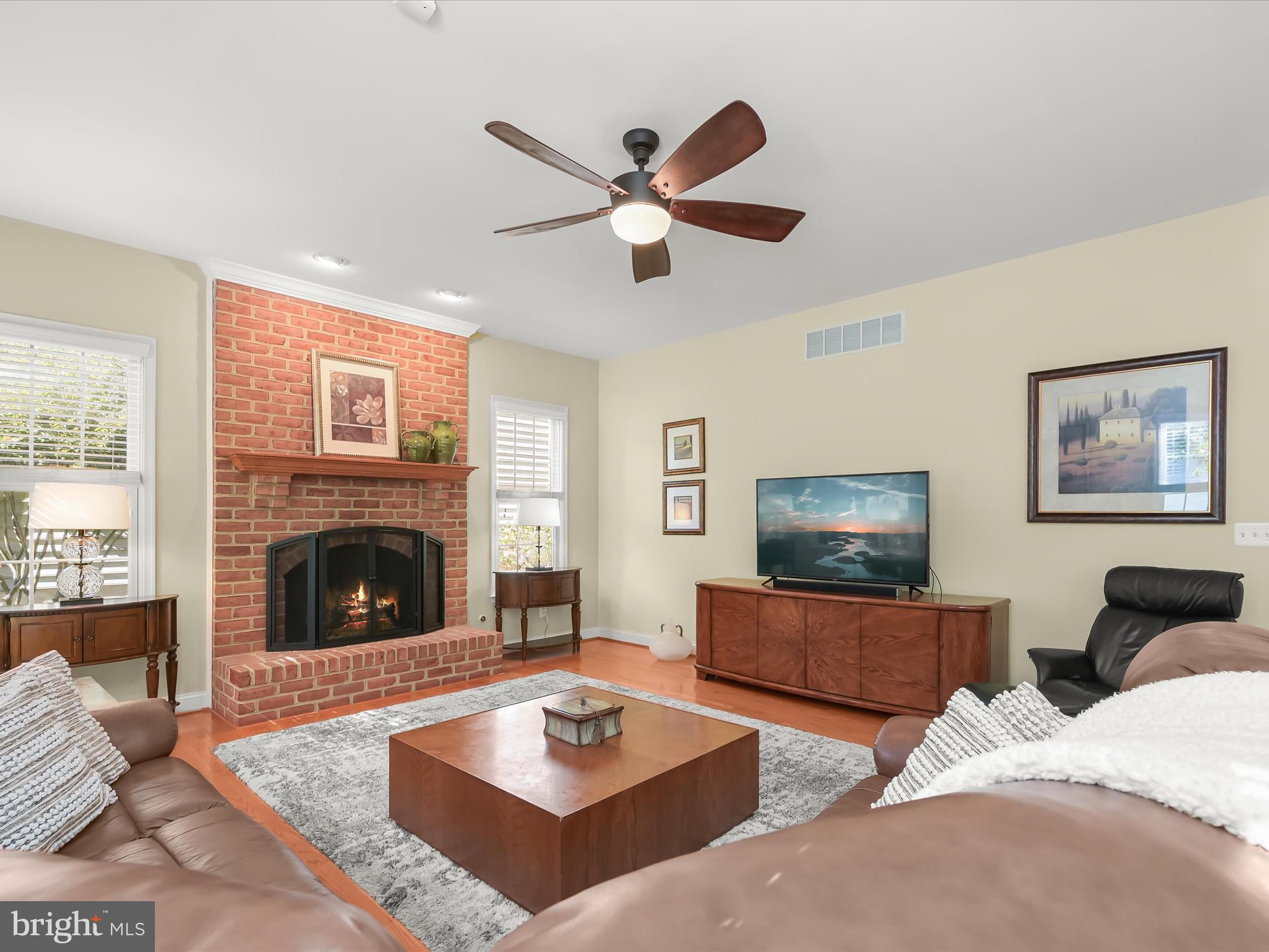 1525 Winfields Lane Gambrills, MD 21054 - Photo 28 of 65 a living room with furniture and a fireplace