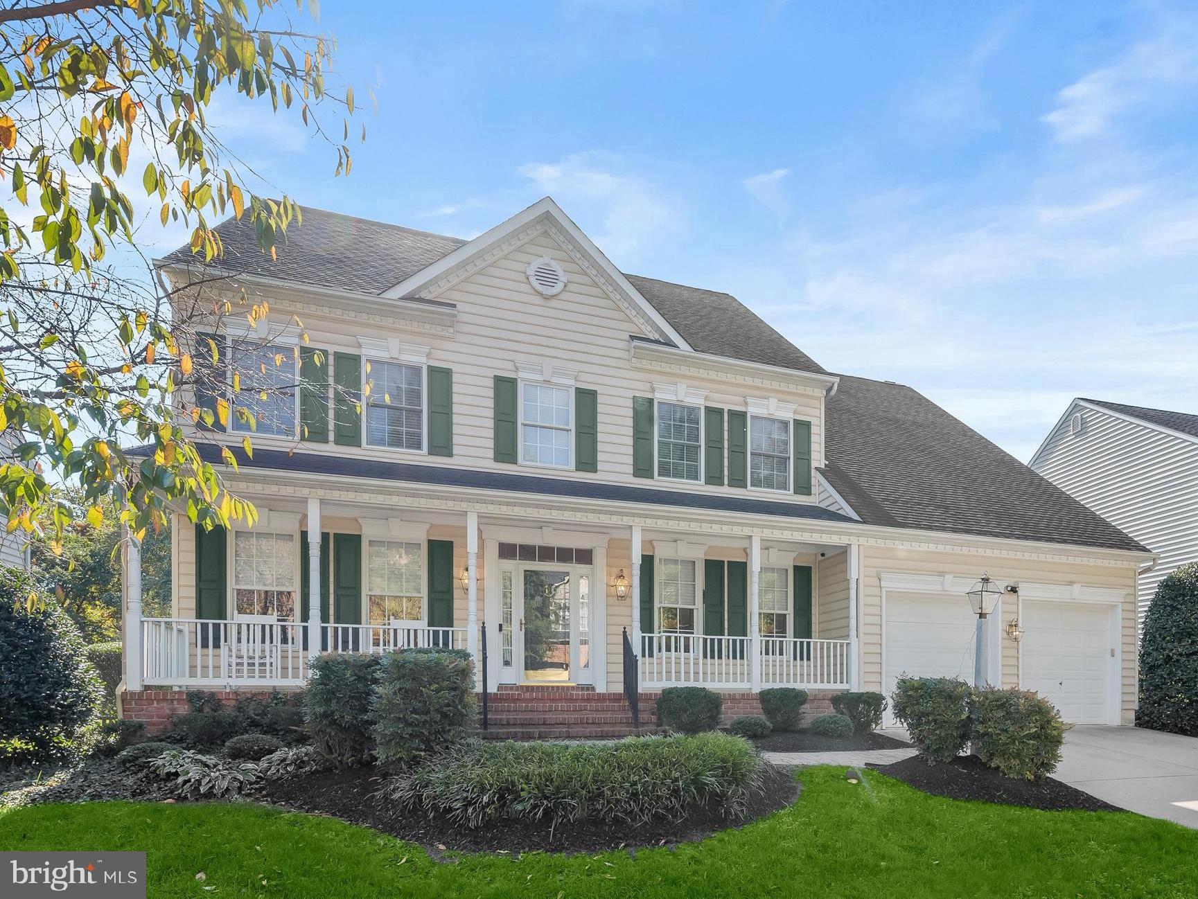 1525 Winfields Lane Gambrills, MD 21054 - Photo 3 of 65 a front view of a house with a yard