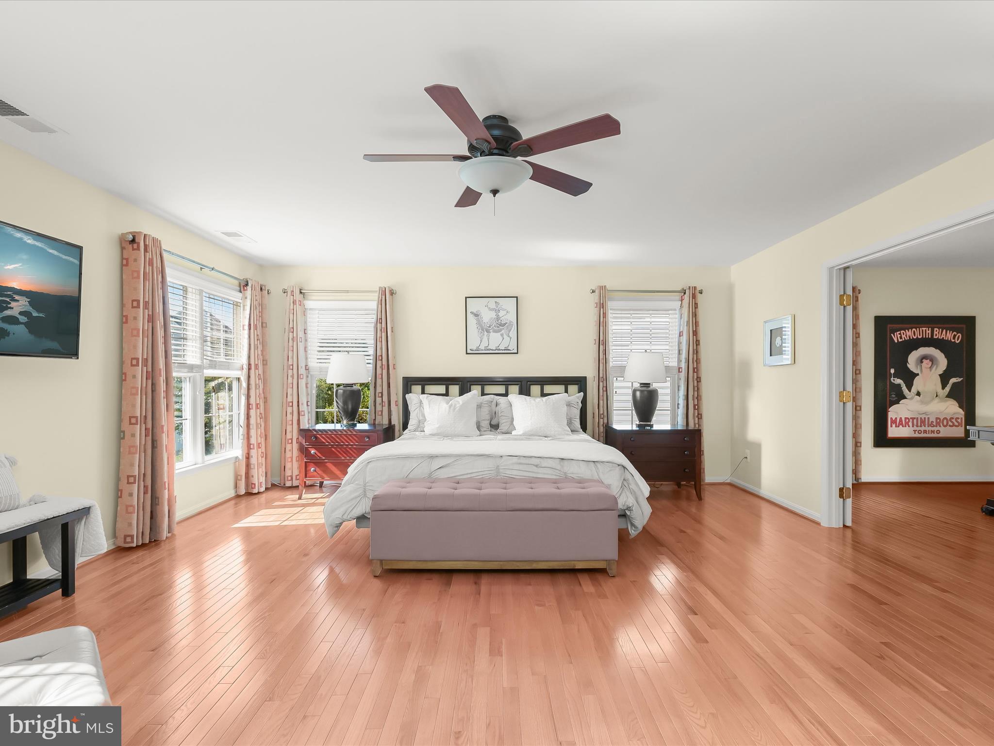 1525 Winfields Lane Gambrills, MD 21054 - Photo 32 of 65 a spacious bedroom with a bed and a large window