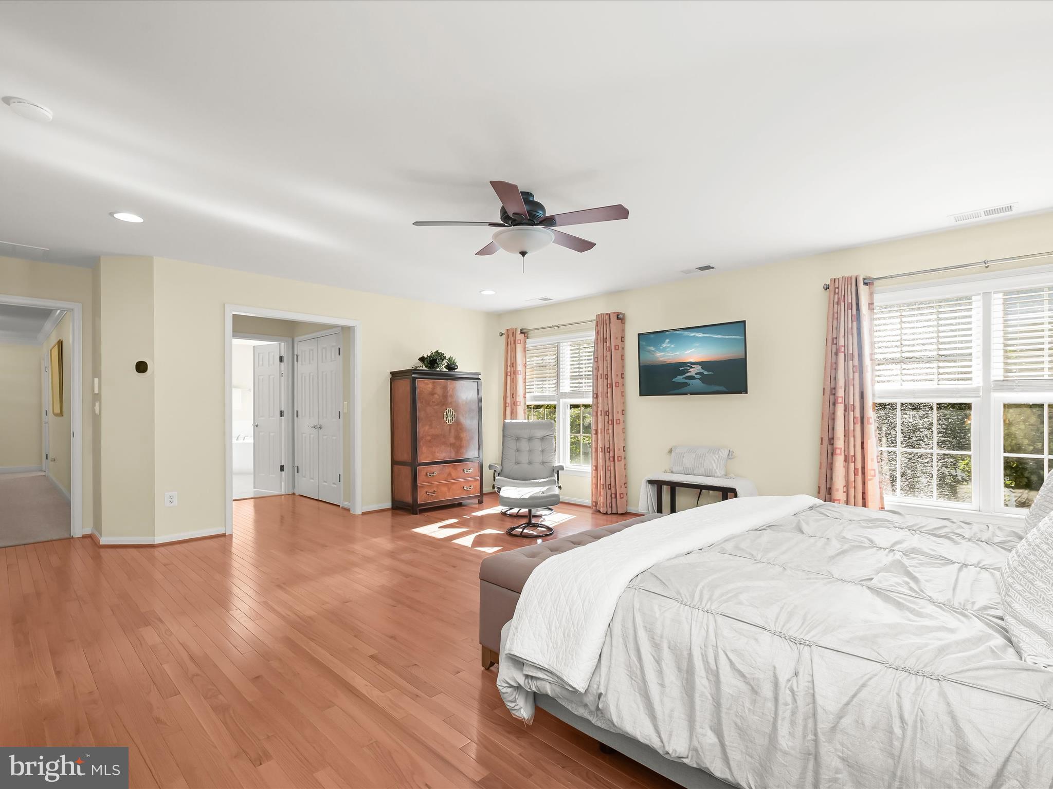 1525 Winfields Lane Gambrills, MD 21054 - Photo 37 of 65 a spacious bedroom with a bed and a ceiling fan