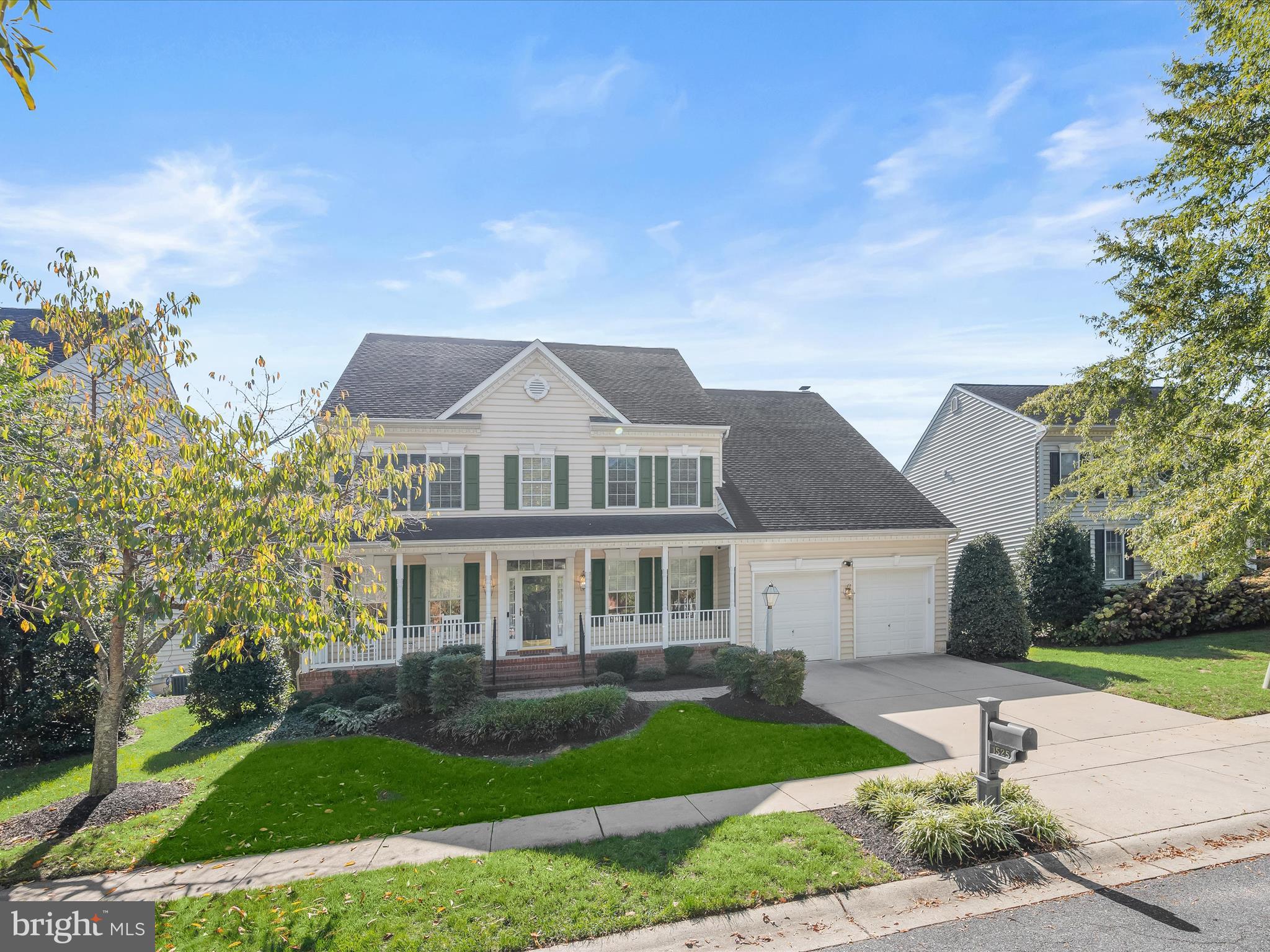 1525 Winfields Lane Gambrills, MD 21054 - Photo 4 of 65 a front view of a house with a garden