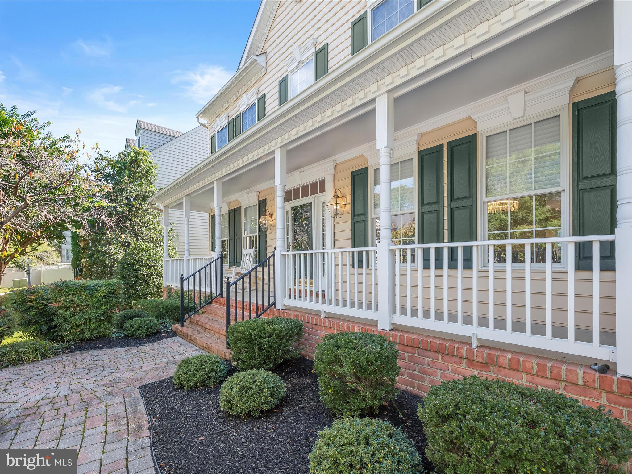 1525 Winfields Lane Gambrills, MD 21054 - Photo 5 of 65 front view of a brick house with a small yard