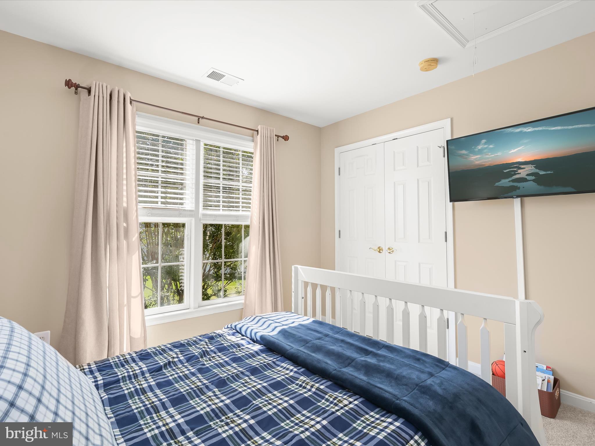 1525 Winfields Lane Gambrills, MD 21054 - Photo 49 of 65 a bedroom with a bed and a window