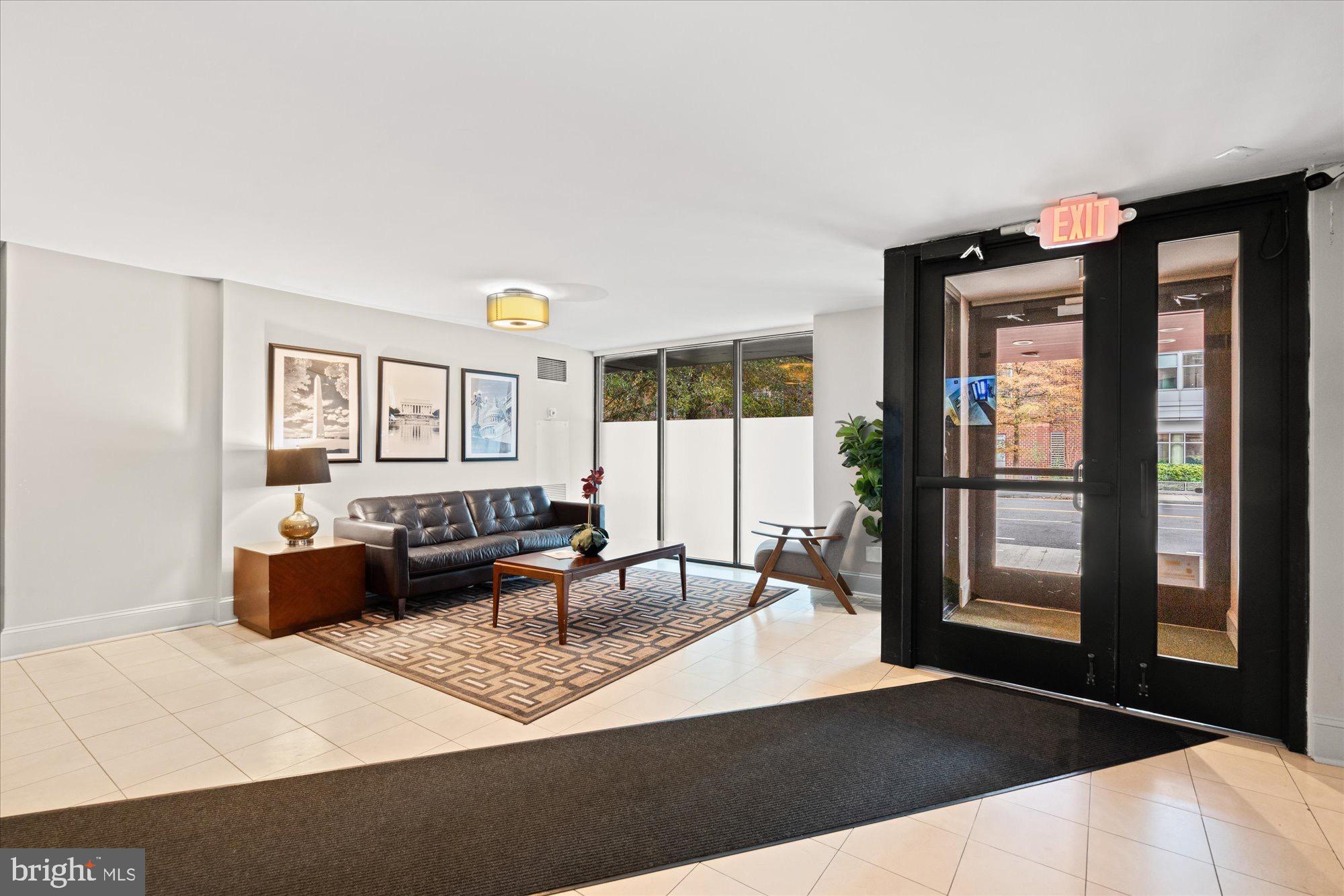 1245 13th Street Northwest, Unit 508 Washington, DC 20005 - Photo 15 of 15 a living room with furniture and a window
