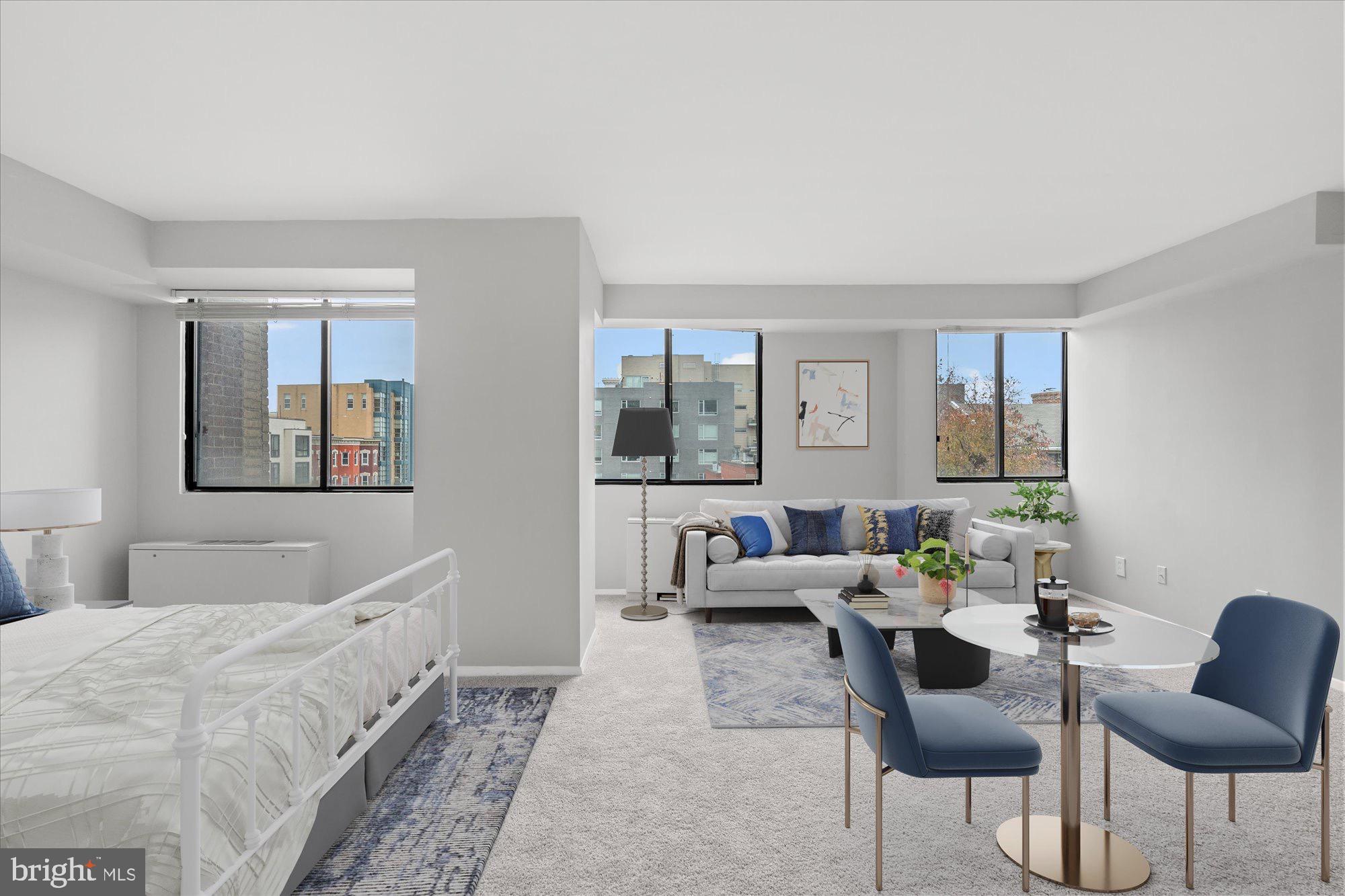 1245 13th Street Northwest, Unit 508 Washington, DC 20005 - Photo 2 of 15 a living room with furniture and a large window