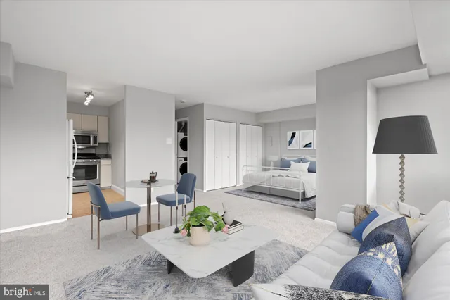 a living room with furniture and a lamp