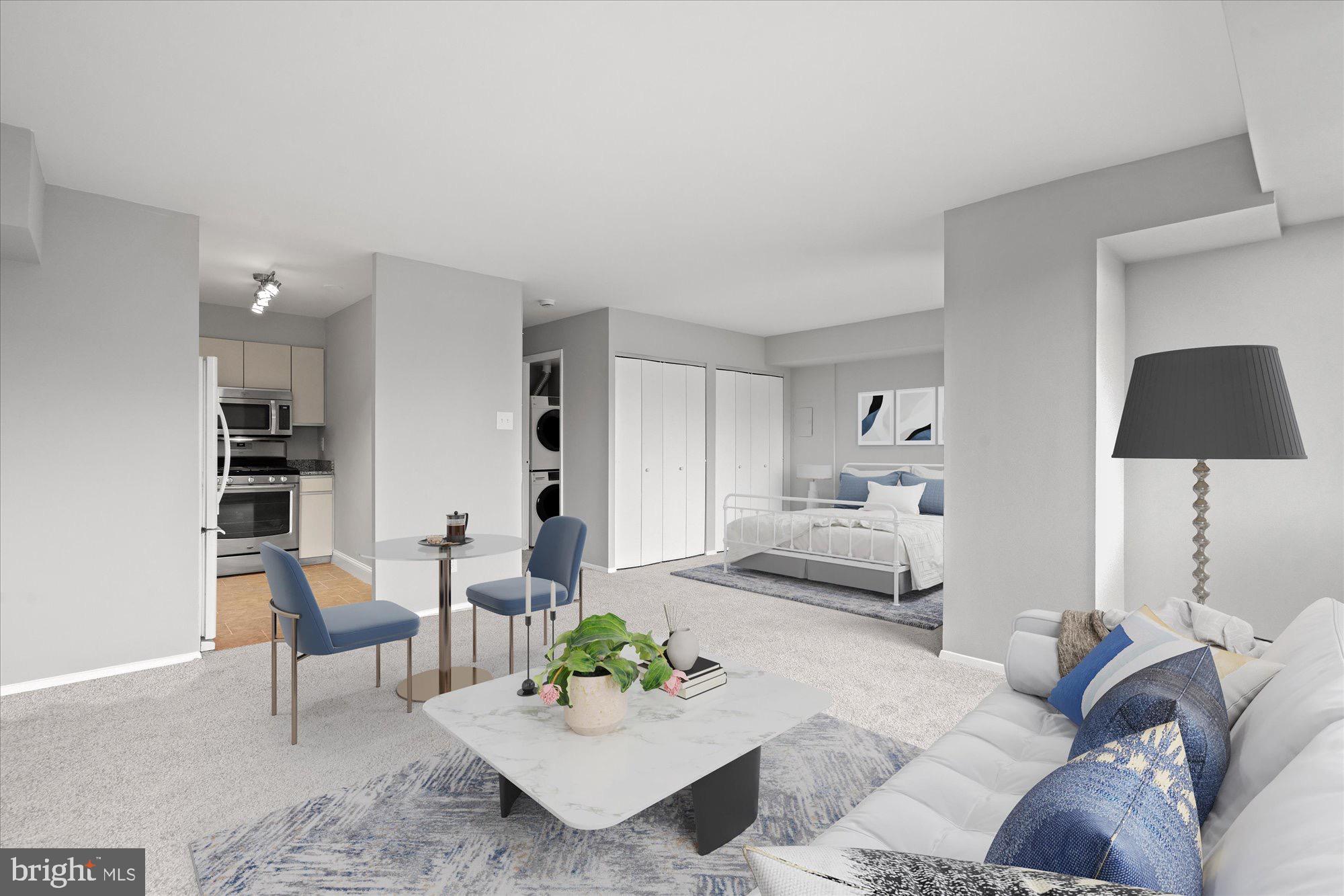 1245 13th Street Northwest, Unit 508 Washington, DC 20005 - Photo 3 of 15 a living room with furniture and a lamp