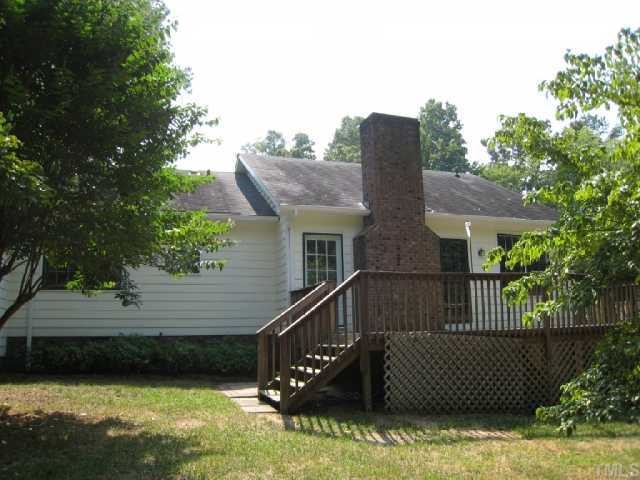 5208 Badham Place Raleigh, NC 27609 - Photo 12 of 12 a view of a house with a yard