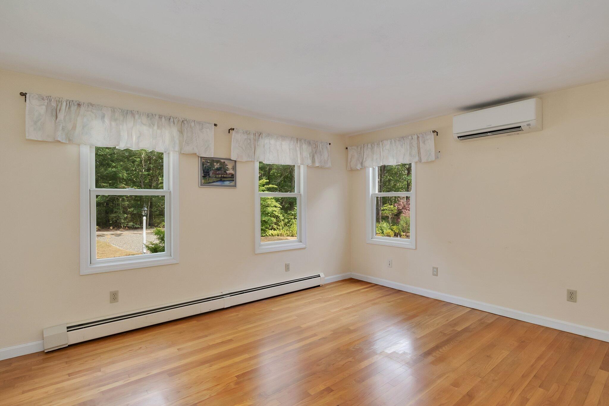 565 Sampsons Mill Road Cotuit, MA 02635 - Photo 33 of 87 an empty room with windows