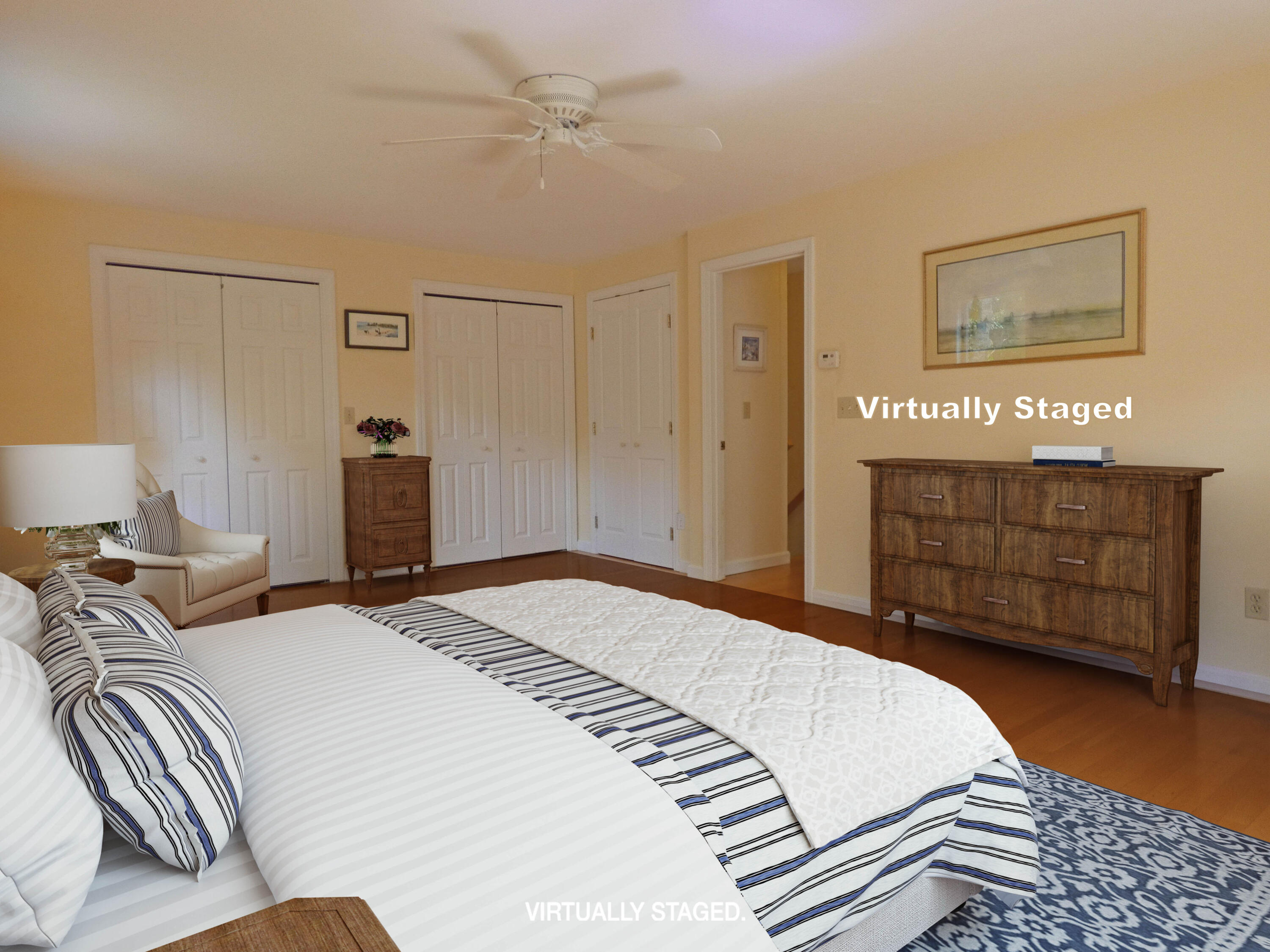 565 Sampsons Mill Road Cotuit, MA 02635 - Photo 39 of 87 a bedroom with a bed and wooden floor