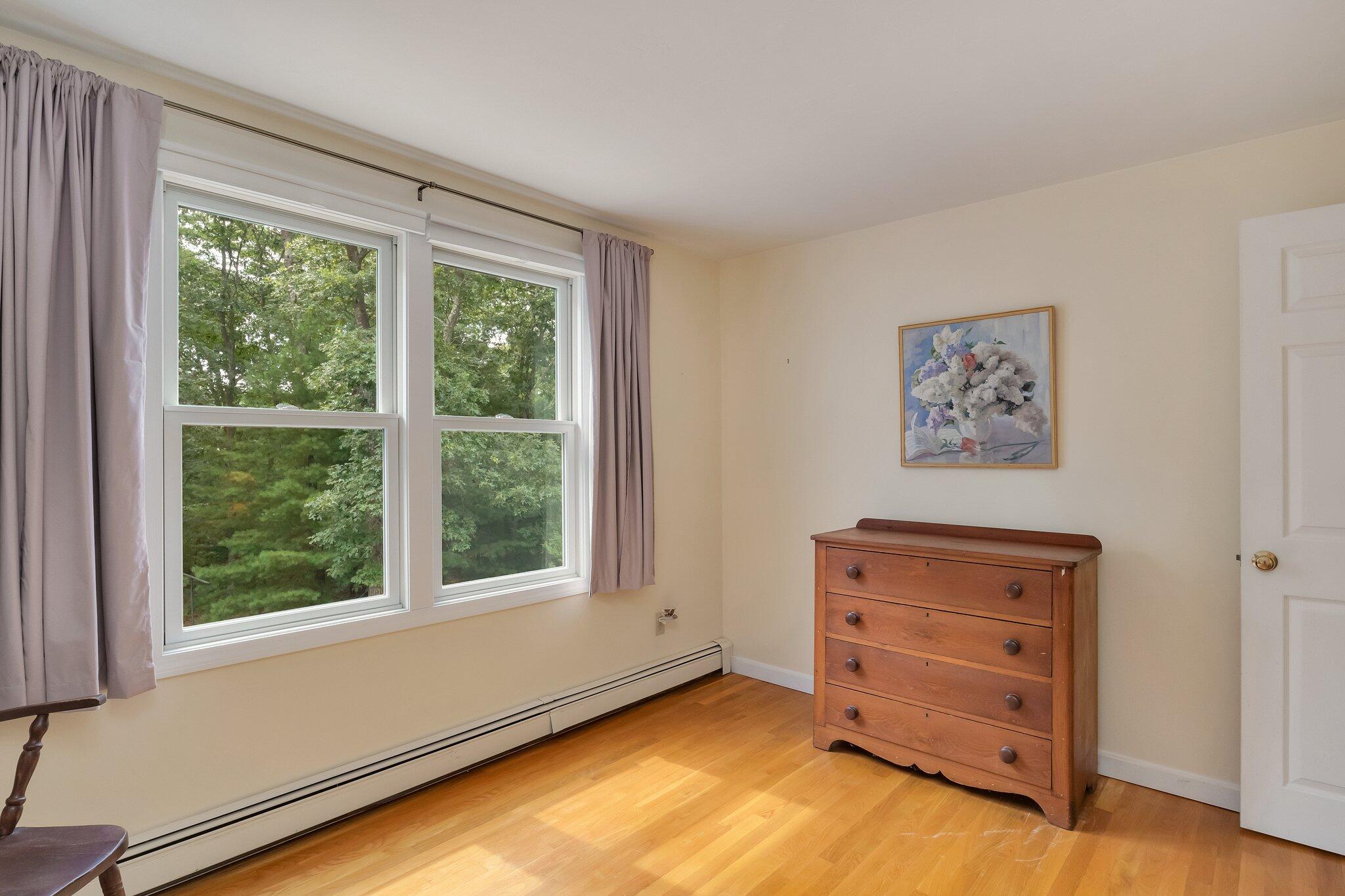 565 Sampsons Mill Road Cotuit, MA 02635 - Photo 53 of 87 a view of room with window and cabinet
